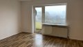 Wohnzimmer mit Balkon